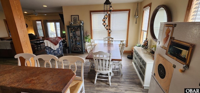 dining room featuring a ceiling fan, dark wood-type flooring, and recessed lighting