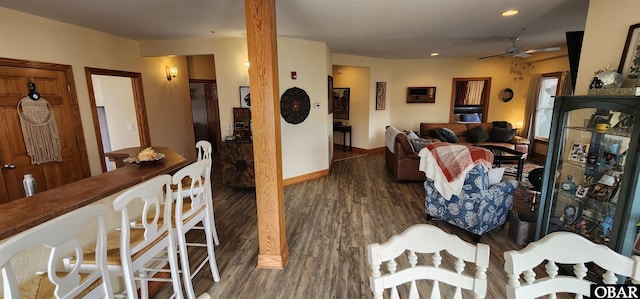 living area with dark wood-style floors, ceiling fan, recessed lighting, and baseboards