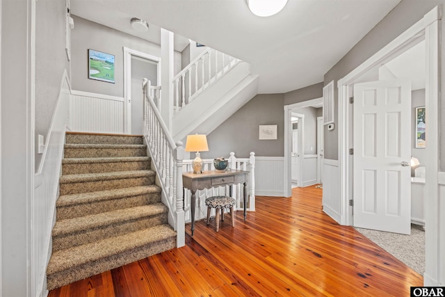 5006 S Links Dr Lot 6, Nags Head, NC 27959 - stairs with a wainscoted wall and wood-type flooring