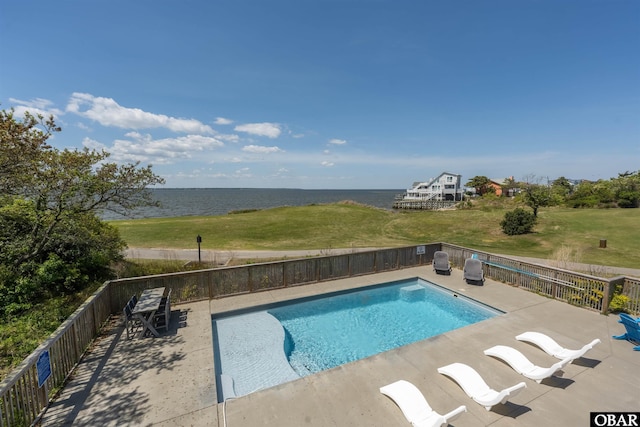 5006 S Links Dr Lot 6, Nags Head, NC 27959 - view of swimming pool featuring a yard, fence, a fenced in pool, a water view, and a patio