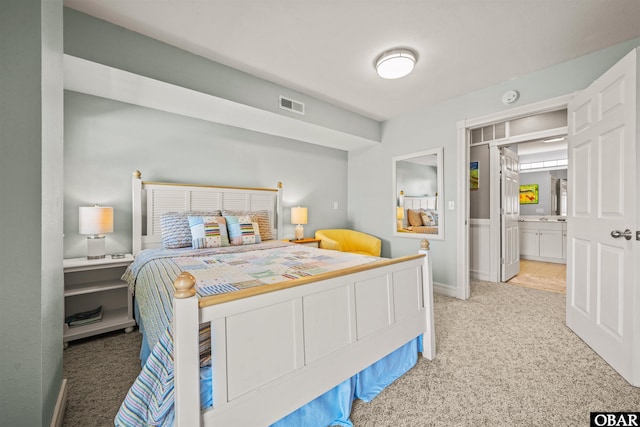 5006 S Links Dr Lot 6, Nags Head, NC 27959 - bedroom featuring visible vents, carpet floors, and ensuite bathroom