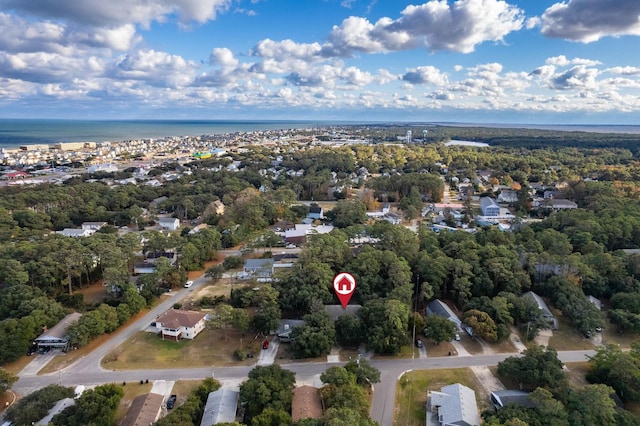 birds eye view of property with a water view and a residential view