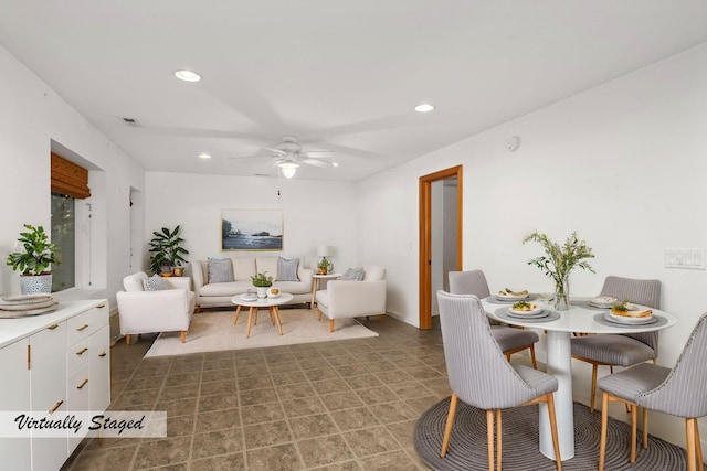 living room with a ceiling fan and recessed lighting