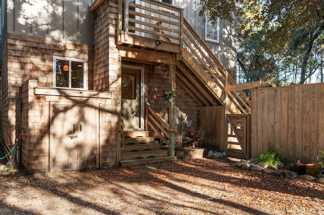 property entrance with fence