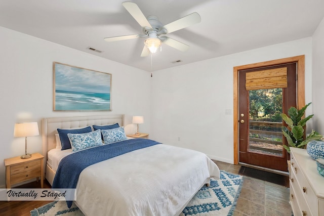 bedroom featuring ceiling fan and visible vents