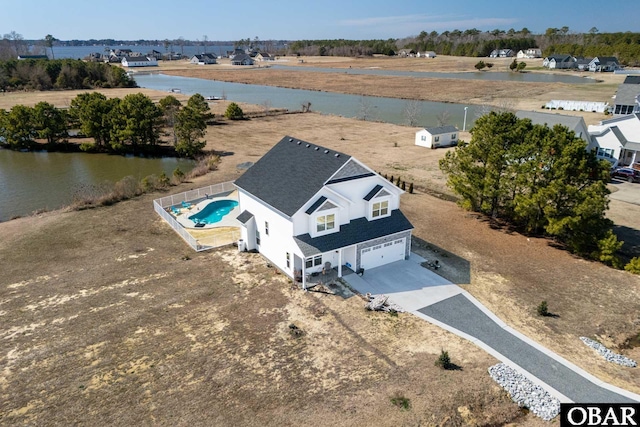 drone / aerial view with a water view