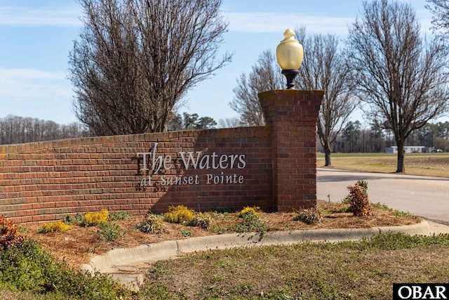 view of community sign