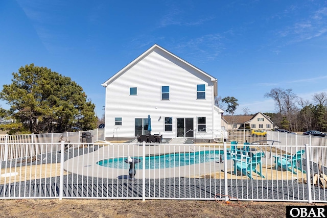 view of pool featuring a fenced in pool, a patio, and a fenced backyard