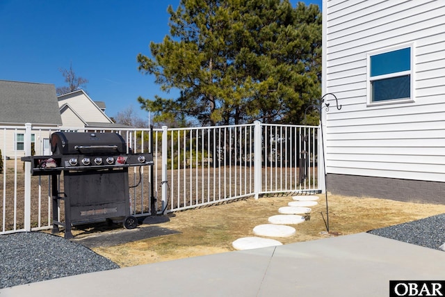 view of gate featuring fence