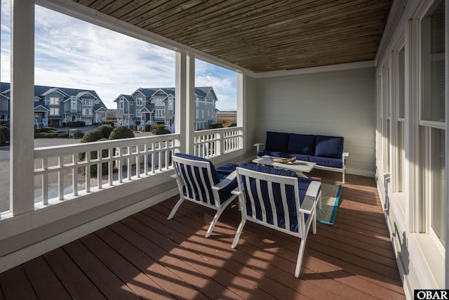 balcony featuring a residential view and outdoor lounge area