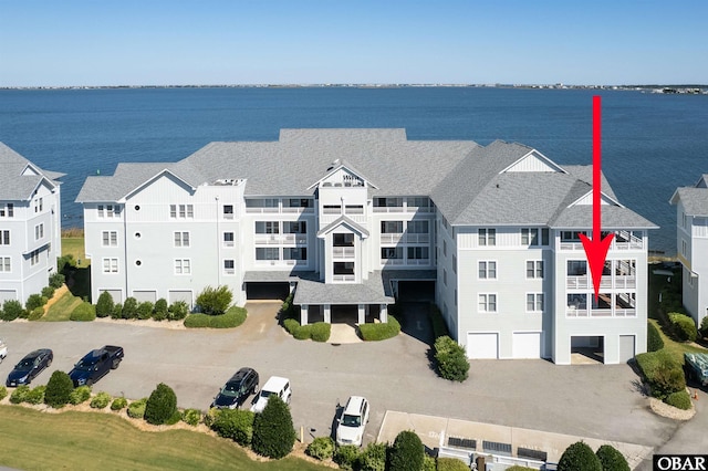 aerial view featuring a water view