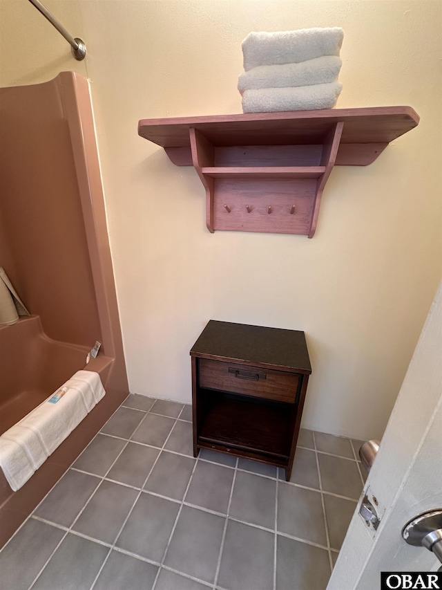 180 Irvin Garrish Hwy Unit 602, Ocracoke, NC 27960 - full bathroom featuring a shower and tile patterned flooring