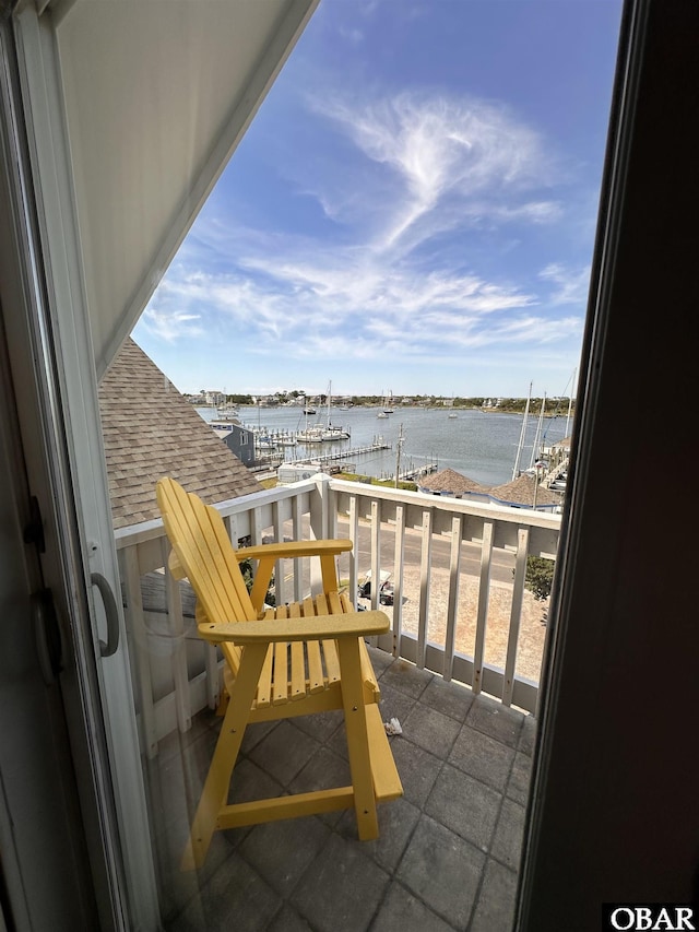 180 Irvin Garrish Hwy Unit 602, Ocracoke, NC 27960 - balcony featuring a water view and view of marina