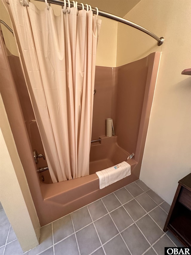 180 Irvin Garrish Hwy Unit 602, Ocracoke, NC 27960 - bathroom featuring shower / bath combo and tile patterned floors