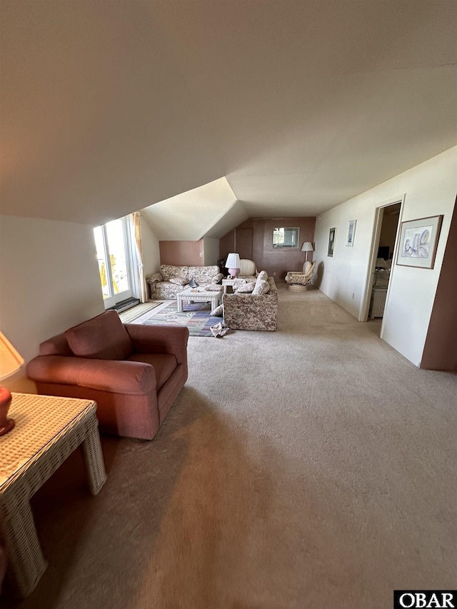 180 Irvin Garrish Hwy Unit 602, Ocracoke, NC 27960 - living area featuring light carpet and lofted ceiling