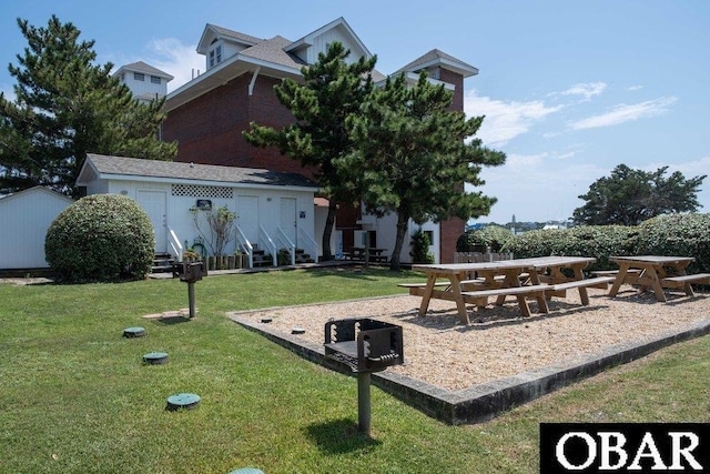 180 Irvin Garrish Hwy Unit 602, Ocracoke, NC 27960 - view of community featuring a yard and entry steps