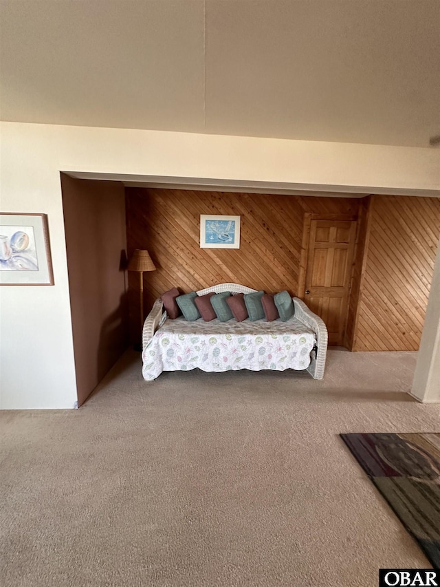 180 Irvin Garrish Hwy Unit 602, Ocracoke, NC 27960 - bedroom featuring wood walls and carpet