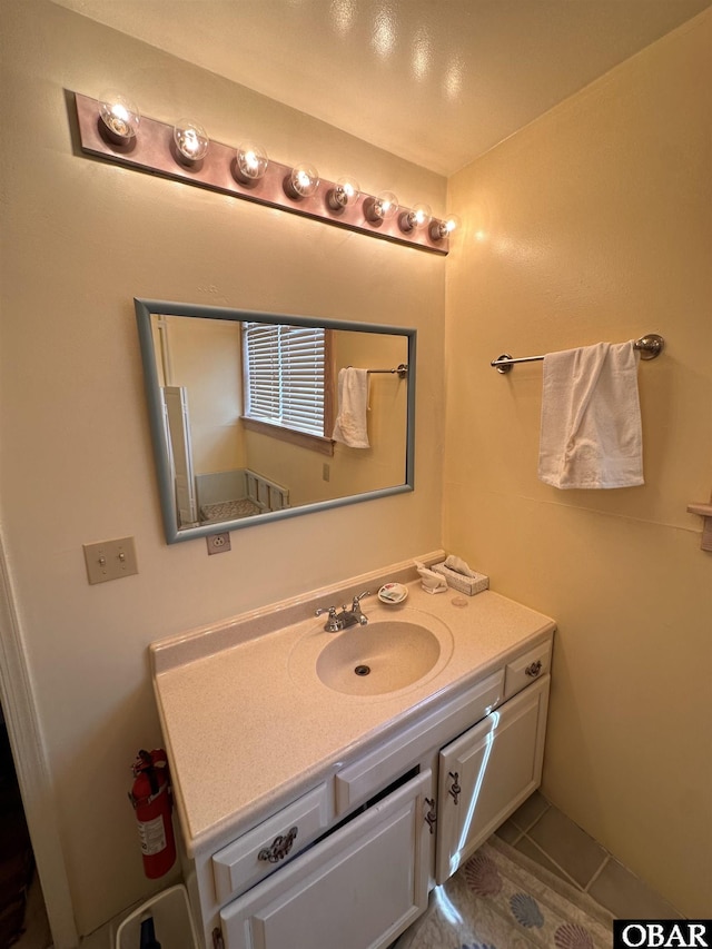 180 Irvin Garrish Hwy Unit 602, Ocracoke, NC 27960 - bathroom with vanity and tile patterned flooring