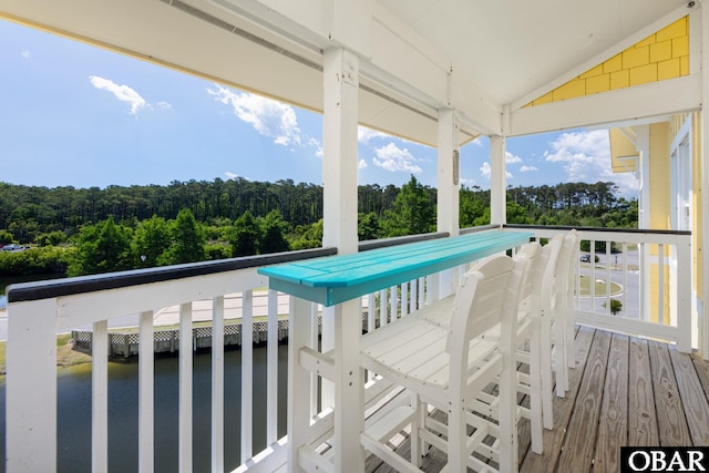 1700 Paget Rd Unit C 3, Kill Devil Hills, NC 27948 - wooden terrace with a water view and a wooded view