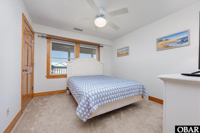 1700 Paget Rd Unit C 3, Kill Devil Hills, NC 27948 - bedroom with baseboards, carpet, and a ceiling fan