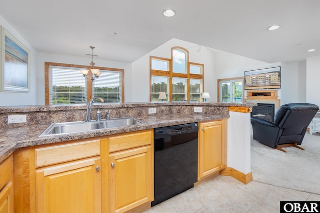 1700 Paget Rd Unit C 3, Kill Devil Hills, NC 27948 - kitchen featuring black dishwasher, a sink, vaulted ceiling, light colored carpet, and a fireplace
