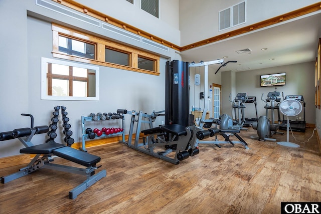 1700 Paget Rd Unit C 3, Kill Devil Hills, NC 27948 - workout area with wood finished floors and a towering ceiling