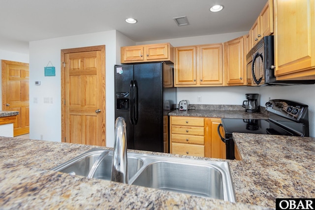 1700 Paget Rd Unit C 3, Kill Devil Hills, NC 27948 - kitchen featuring black appliances, a sink, and recessed lighting