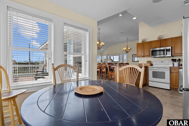 24205 Caribbean Ct Lot 8, Rodanthe, NC 27968 - dining area with a chandelier, vaulted ceiling, and recessed lighting
