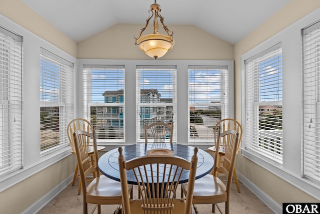 24205 Caribbean Ct Lot 8, Rodanthe, NC 27968 - dining space with baseboards, plenty of natural light, and vaulted ceiling