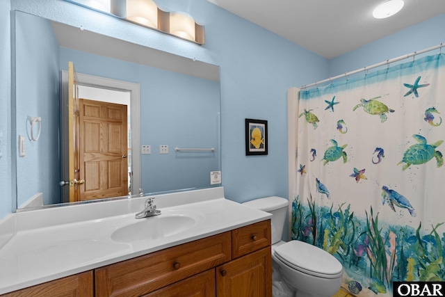 24205 Caribbean Ct Lot 8, Rodanthe, NC 27968 - full bathroom featuring toilet, vanity, and a shower with curtain