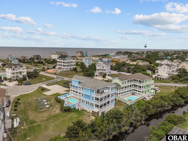 24205 Caribbean Ct Lot 8, Rodanthe, NC 27968 - drone / aerial view of a pool area and a large body of water