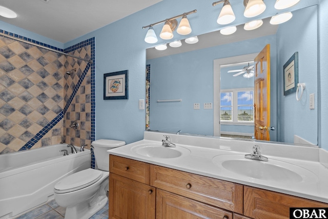24205 Caribbean Ct Lot 8, Rodanthe, NC 27968 - full bathroom featuring toilet, double vanity, bathing tub / shower combination, a ceiling fan, and tile patterned floors