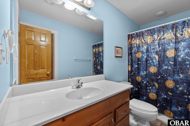 24205 Caribbean Ct Lot 8, Rodanthe, NC 27968 - full bathroom featuring toilet, vanity, and curtained shower