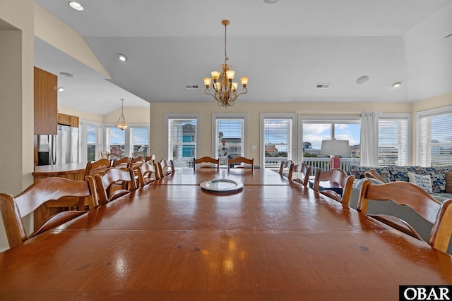 24205 Caribbean Ct Lot 8, Rodanthe, NC 27968 - dining area with lofted ceiling, healthy amount of natural light, a chandelier, and recessed lighting