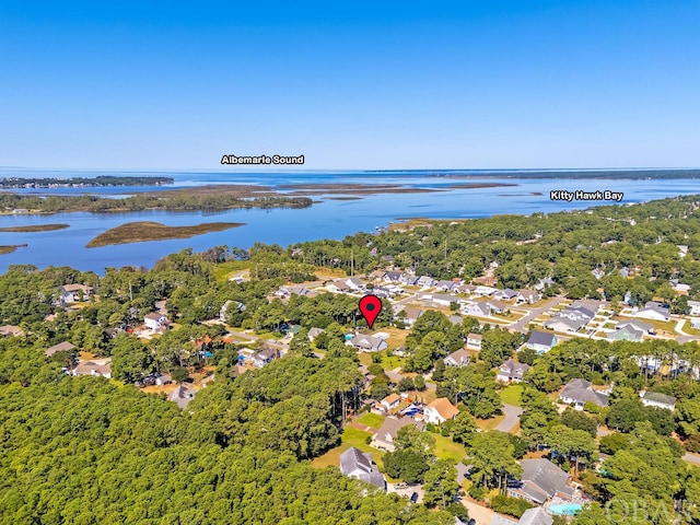 birds eye view of property with a water view and a residential view