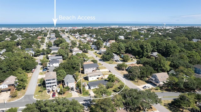 birds eye view of property featuring a water view and a residential view