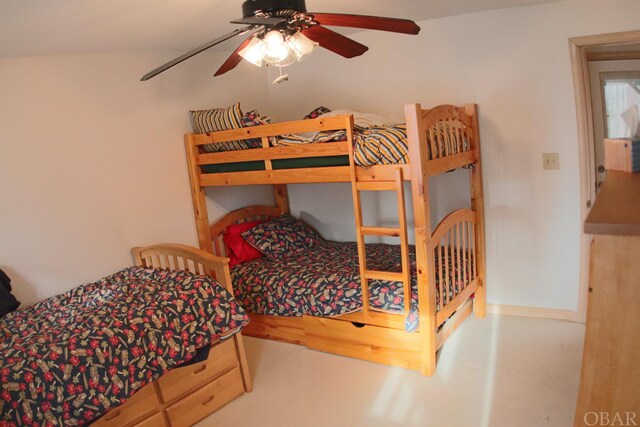 bedroom featuring a ceiling fan and baseboards