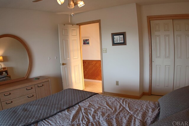 bedroom featuring a ceiling fan and a closet