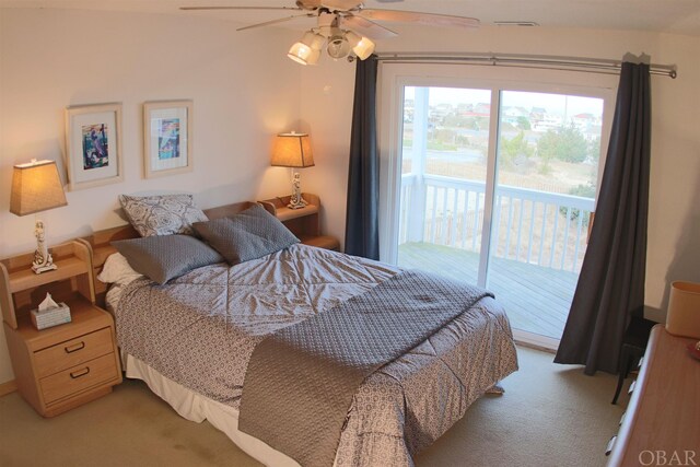 bedroom with access to exterior, light carpet, and a ceiling fan