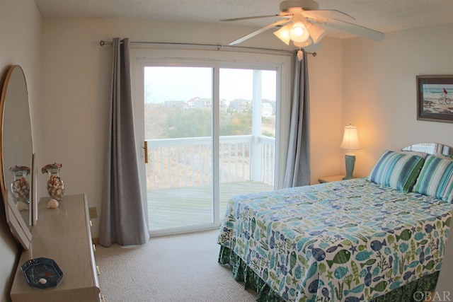 bedroom featuring carpet floors, access to exterior, and ceiling fan