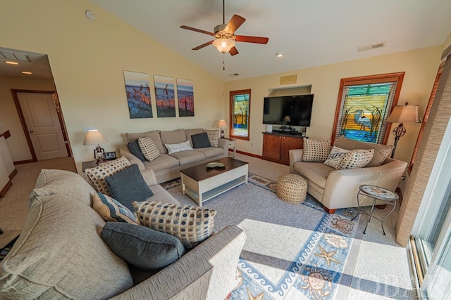 carpeted living area featuring visible vents, vaulted ceiling, baseboards, and ceiling fan