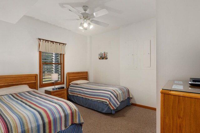 bedroom featuring carpet flooring, ceiling fan, and baseboards