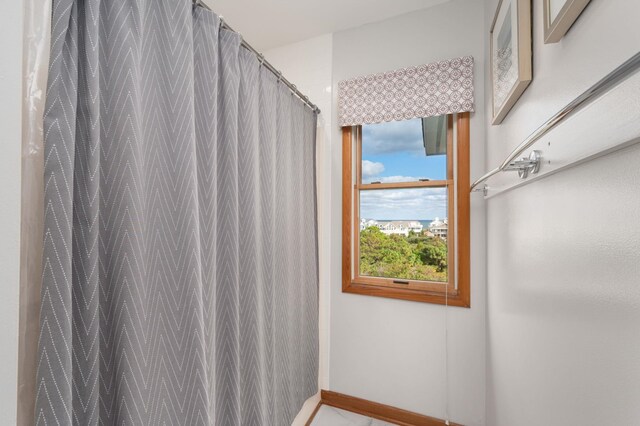 full bathroom with a shower with shower curtain