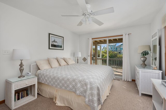 bedroom with access to exterior, a ceiling fan, and light colored carpet