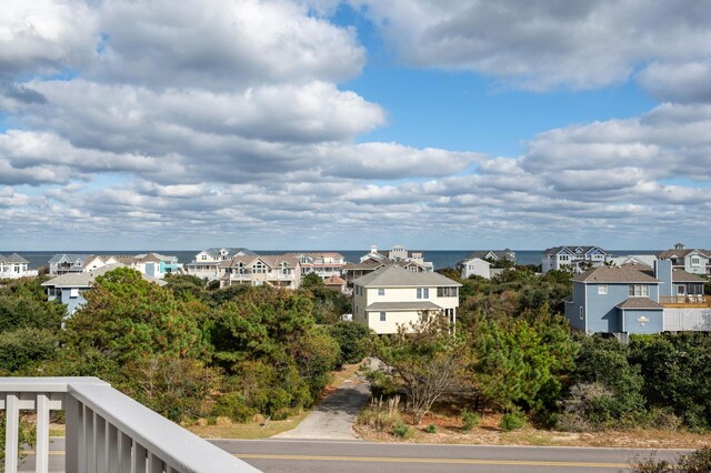 view of water feature with a residential view