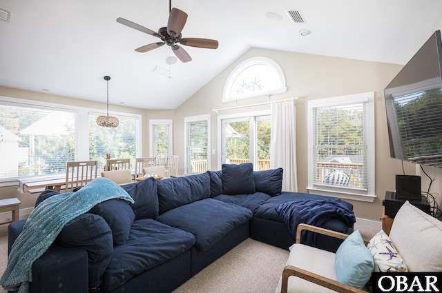 living area with vaulted ceiling, carpet, visible vents, and a ceiling fan