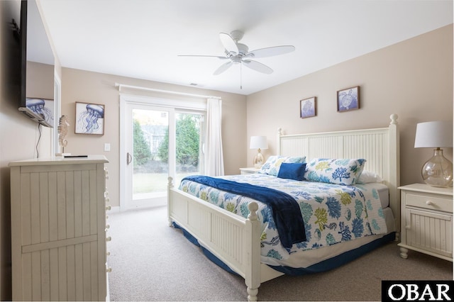 carpeted bedroom featuring a ceiling fan and access to outside
