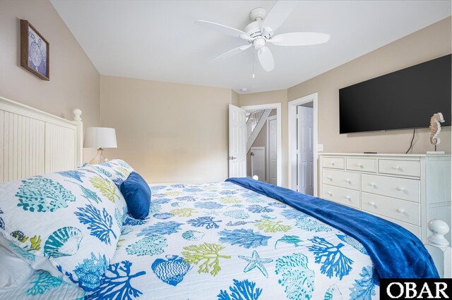 bedroom featuring ceiling fan