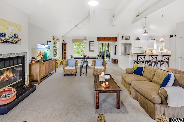 1127 Brumsey Ct Lot 324, Corolla, NC 27927 - living room with light carpet and a tile fireplace