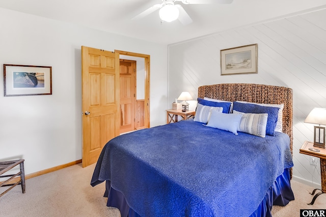 1127 Brumsey Ct Lot 324, Corolla, NC 27927 - carpeted bedroom featuring baseboards and a ceiling fan